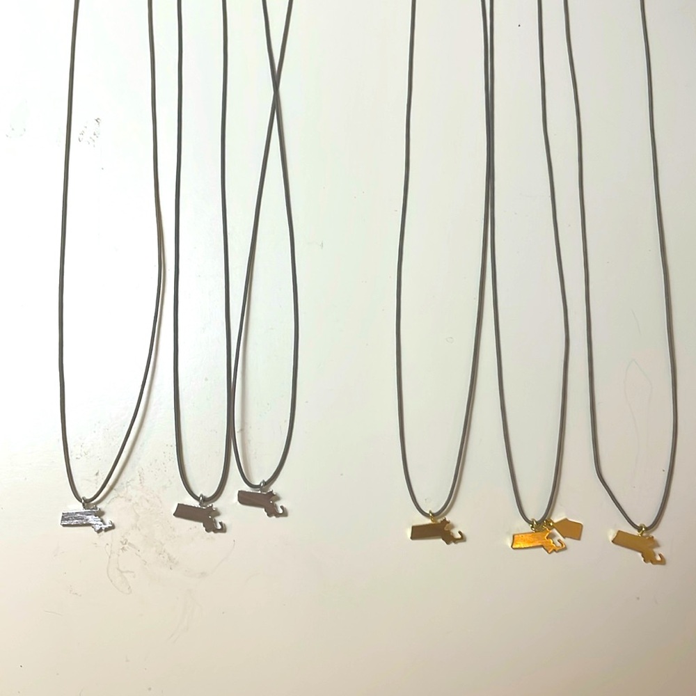 Massachusetts charm necklaces lot of 6. Three silver and three gold on cording